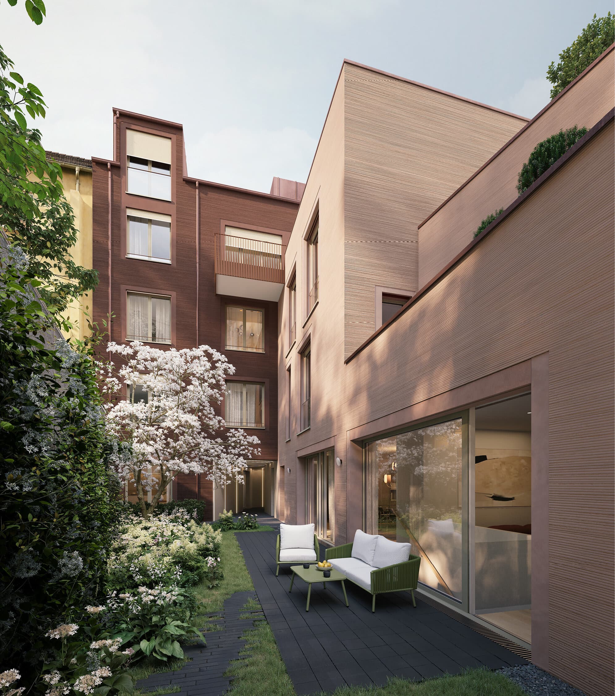 Gartenmaisonette mit Terrasse, Sitzmöbeln und Bepflanzung