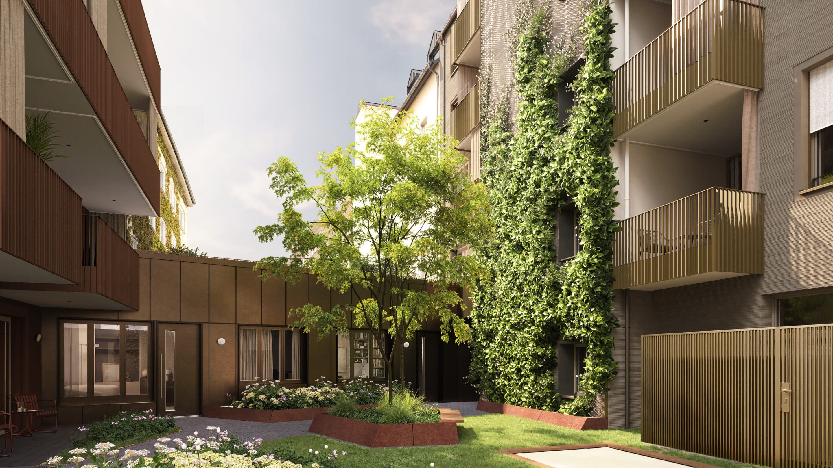 Begrünter Innenhof mit Baum vor der efeubewachsenen Messingfassade des Atelierhauses