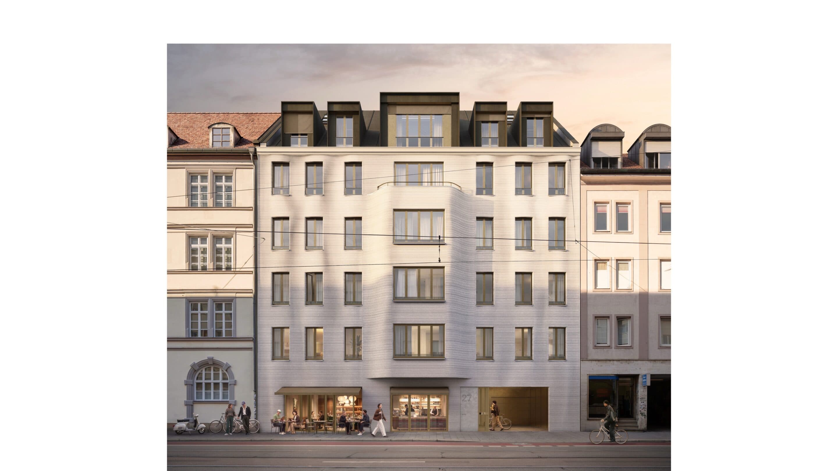 Straßenfassade des Glockenhofer in der Fraunhoferstraße im Abendlicht